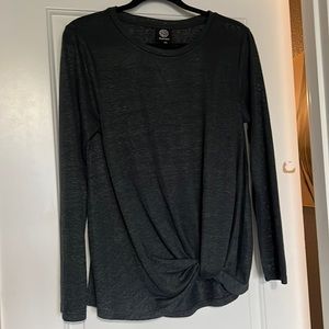 Light weight long sleeve top with knotted feature at waist